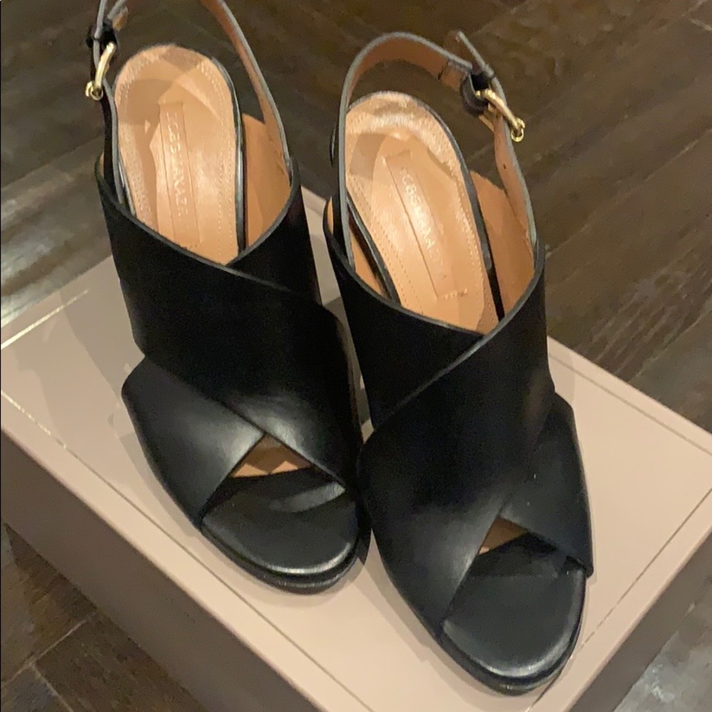 BCBG MaxAzria black leather sandals
